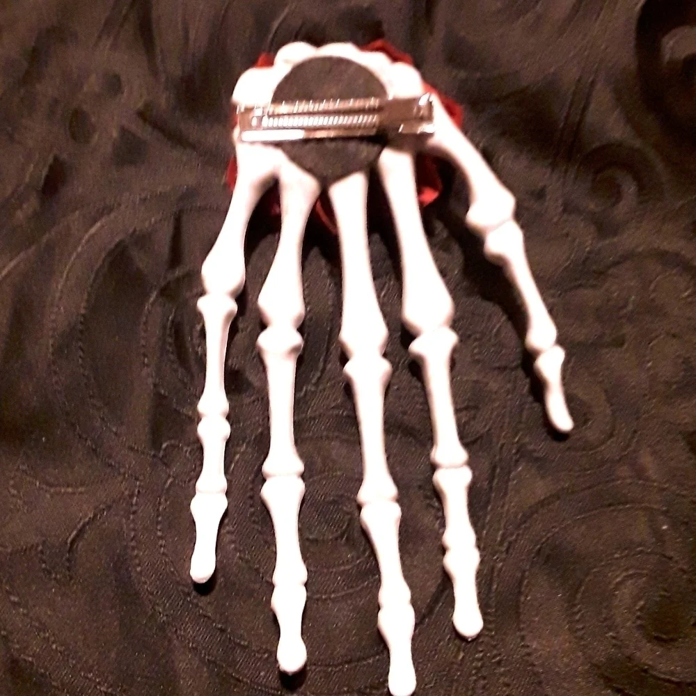 Skeleton hand rose hair clip